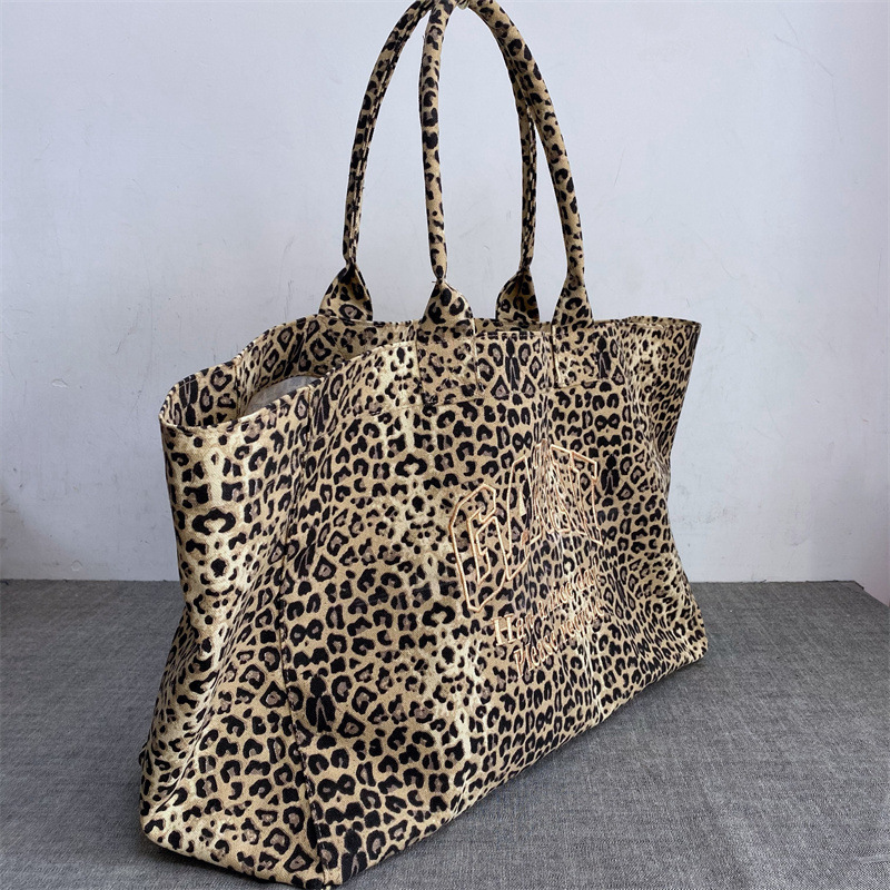 Yoga Fitness Bag - กระเป๋าผ้าแคนวาสลายเสือดาวปักลายสำหรับทุกเพศ กระเป๋าถือแบบสบายๆ กระเป๋าช้อปปิ้งนำกลับมาใช้ใหม่ได้ กระเป๋าสะพายแฟชั่นสำหรับผู้ชายและผู้หญิง ใช้ได้ทุกวัน